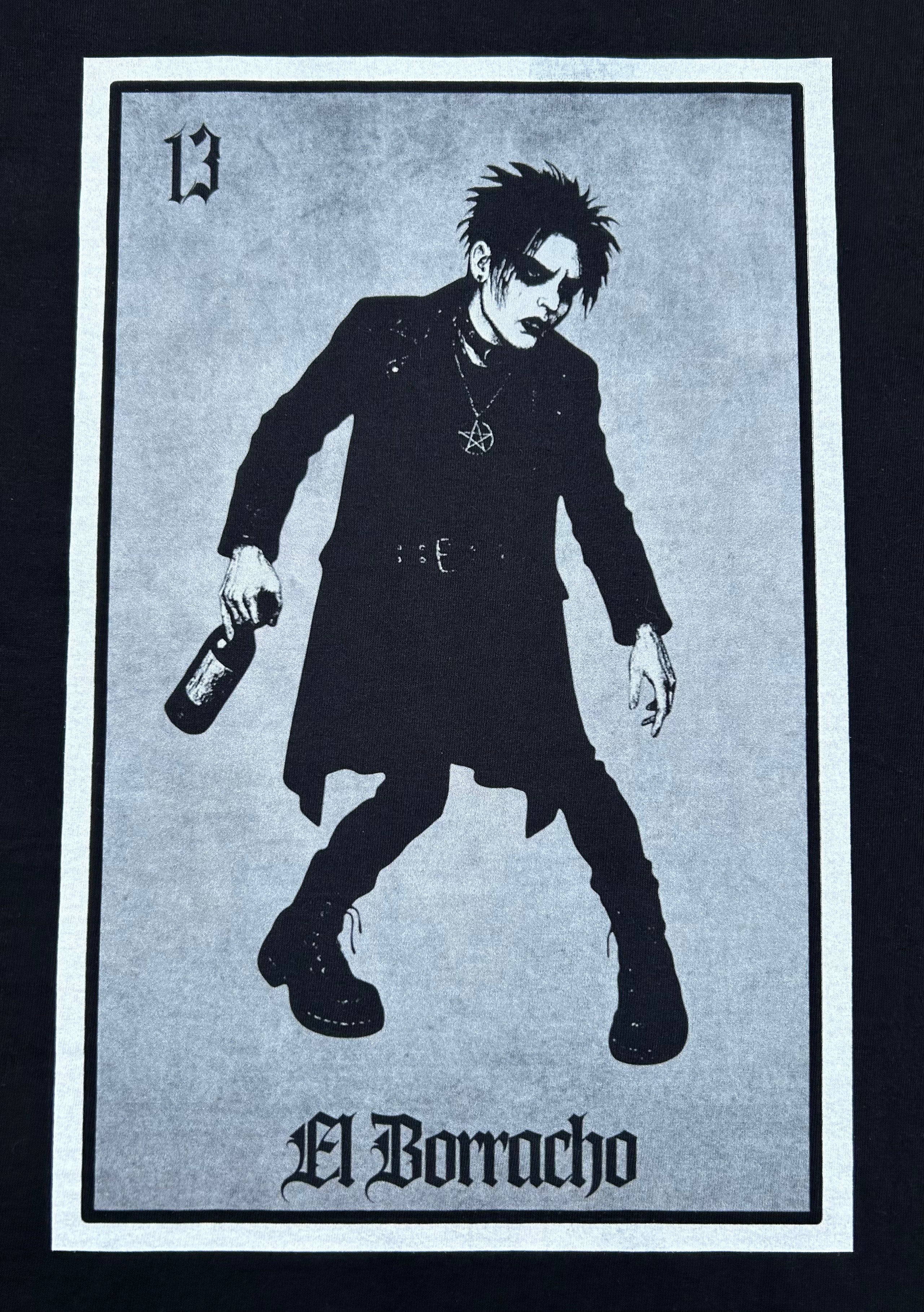 black t-shirt graphic labeled 'El Borracho' holding a bottle on a card-like background.