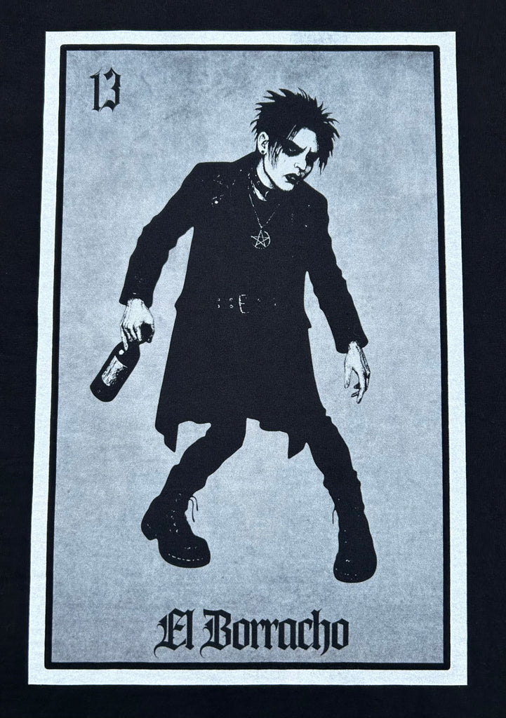 black t-shirt graphic labeled 'El Borracho' holding a bottle on a card-like background.