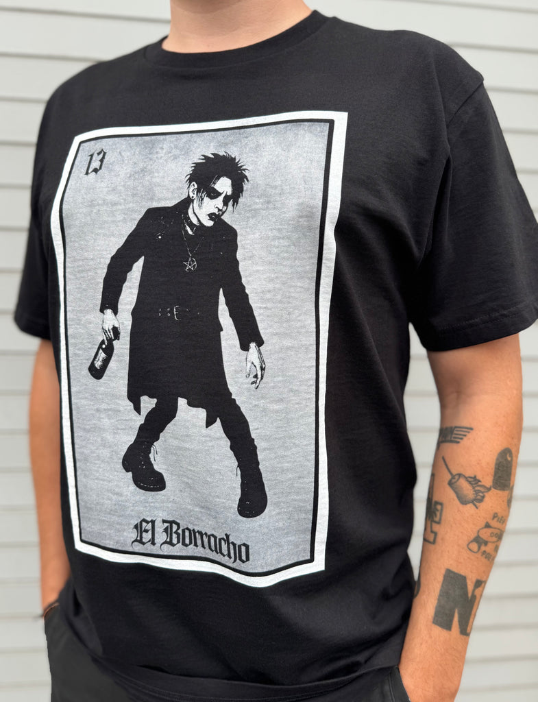 Black t-shirt with a graphic design of a person labeled 'El Borracho' on a plain background